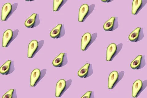 Many halves of avocado, pattern, banner. Billet bright background, pink purpl Stock Photos