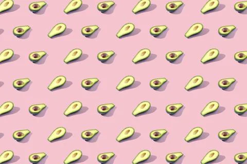 Many halves of avocado, pattern, banner. Blank bright background, pink orange Stock Photos