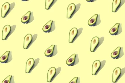 Many halves of avocado, pattern, banner. Workpiece bright background, pastel  Stock Photos