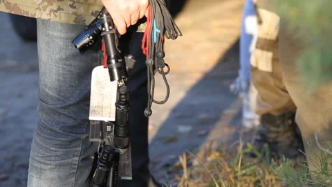 Many hand-held electric torches and compasses in the hands of the rescuer Stock Footage 166663696