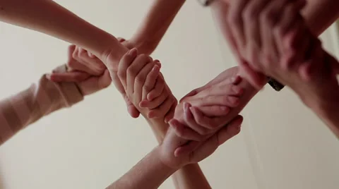 Many hands are connected greeting Stock Footage