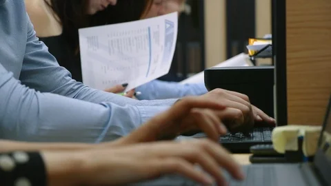 Many hands are typing on a laptop Видео 98499343