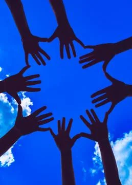 Many hands on the dark sky background Stock Photos