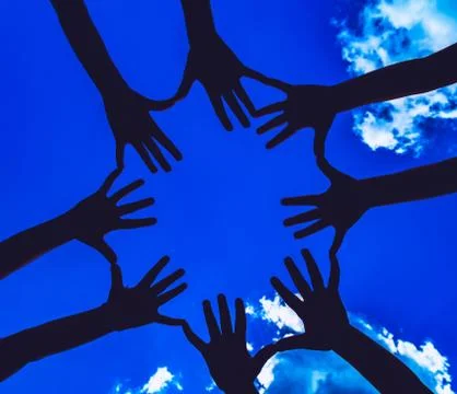 Many hands on the dark sky background Stock Photos