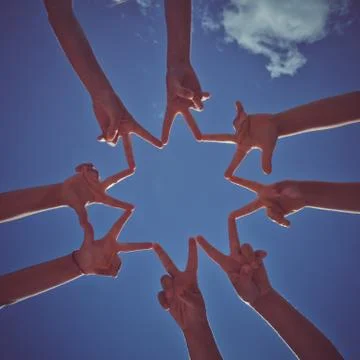 Many hands on the dark sky background Stock Photos