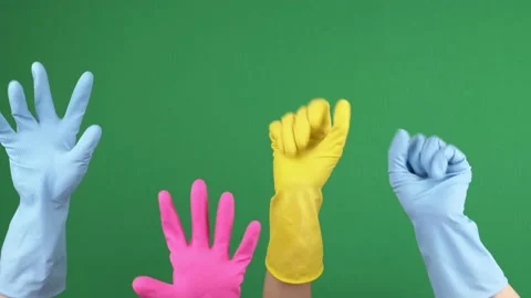 Many hands with protective rubber gloves joyfully clench and unclench their Stock Footage 155615234