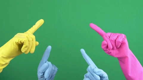 Many hands with protective rubber gloves rise up and fingers point upwards over Stock Footage 156079306