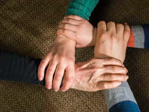 Many hands together Stock Photos