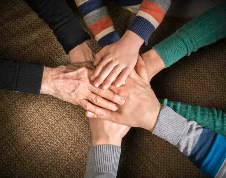Many hands together Stock Photos