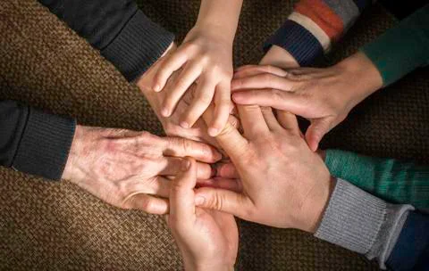 Many hands together Stock Photos