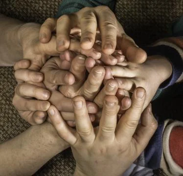 Many hands together Stock Photos