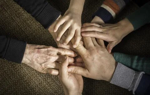 Many hands together Stock Photos