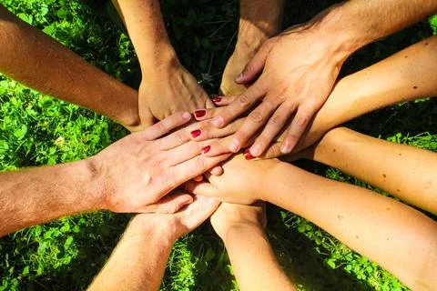 Many hands together Stock Photos