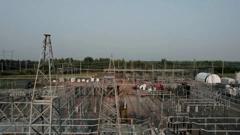 Many High Voltage Electrical Insulators In Power Substation Against Blue Sky Stock Footage 307116288