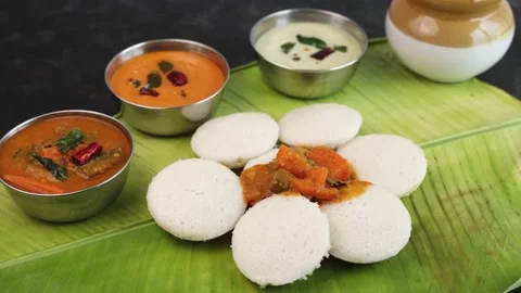 Many Idli idly sambar coconut chutney vegetarian breakfast Stock Footage 149020314