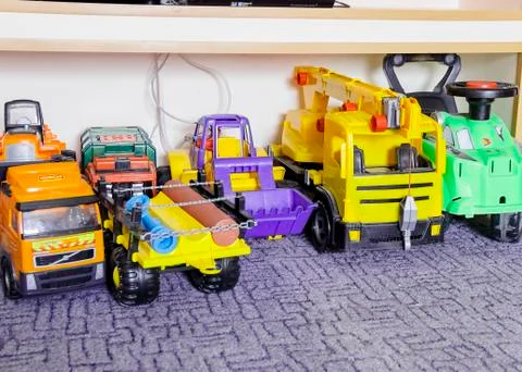 Many large multi-colored plastic machines beautiful toys Stock Photos