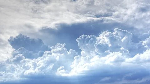 Many large white clouds in the sky gathered in the afternoon of the day. Stock Photos
