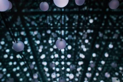 Many light bulbs that go down with their cables from Stock Photos
