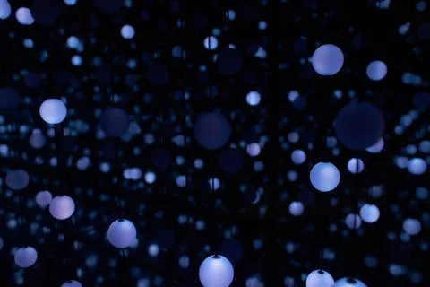 Many light bulbs that go down with their cables from Stock Photos