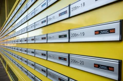 Many mailboxes in a row Stock Photos