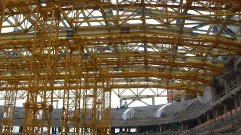 Many metal beams to help with the construction of the roof Stock Footage 119487670