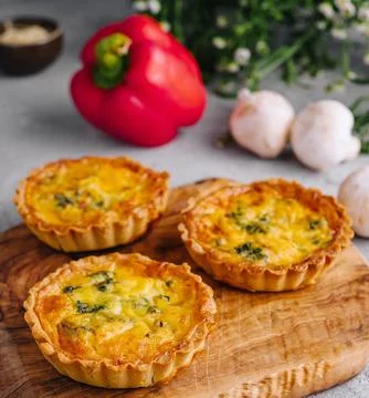 Many mini bite size quiche appetizers Stock Photos