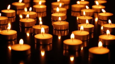 Many Mini burning candles Stock Footage 57276535