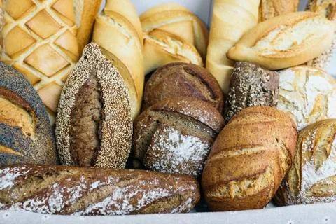 Many mixed breads and rolls. Stock Photos