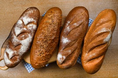 Many mixed breads and rolls shot from above. Top view of assortment of differ Foto stock