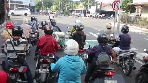 Many motorcycles roam the streets Java Indonesia Video stock 219608462