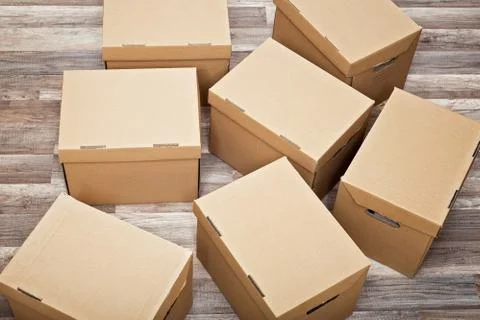 Many moving boxes on the floor Stock Photos