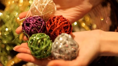 Many multi-colored Christmas sparkling Christmas toys in a basket. Stock Footage 70797634