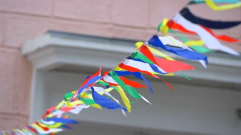 Many multi-colored flags sway in the wind. Stock Footage 197550687