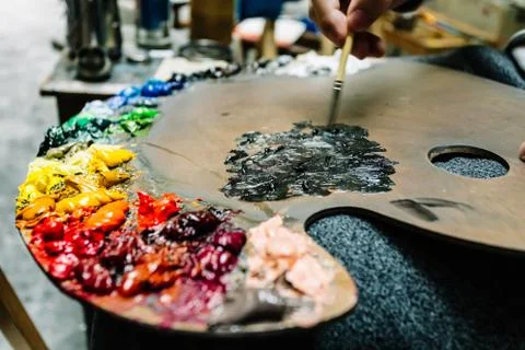 Many multi-colored paints. Stock Photos