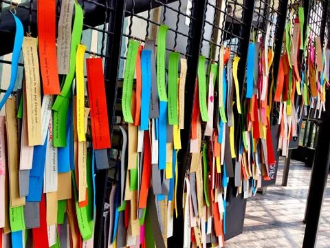 Many multi-colored ribbons on the wall Stock Photos