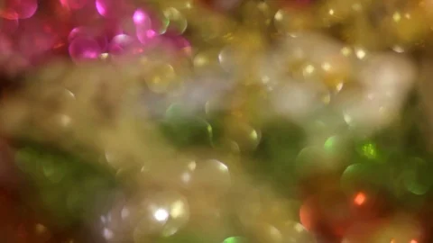 Many multi-colored sparkling Christmas tree decorations in box. Stock Footage 70797274