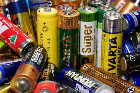 Many multi-colored used batteries from various manufacturers Stock-Fotos