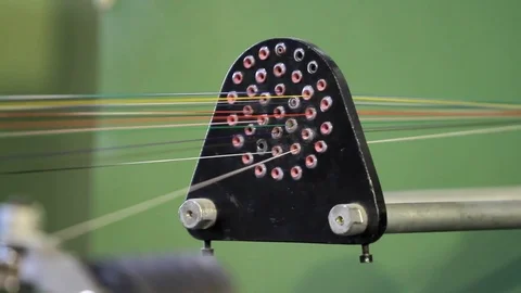 Many multicolored cables are unwound in one Stock-Footage 76951089