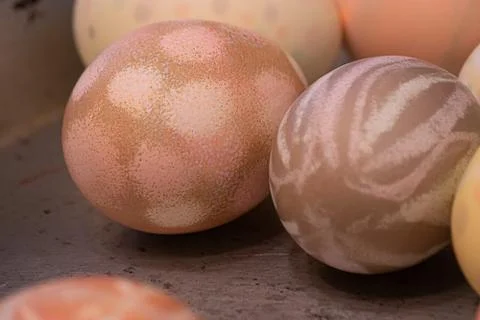 Many multicolored eggs with different patterns dyed for easter Foto stock