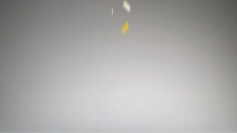 Many multicolored tablets fall on the table.A huge number of pills falling Stock Footage 127620902