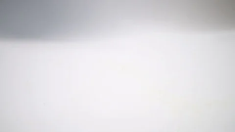 Many multicolored tablets fall on the table,huge pills,shooting from above Stock Footage 127620439