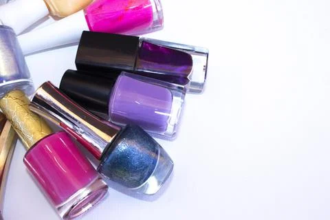 Many nail varnish bottles on the table Stock Photos