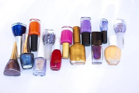 Many nail varnish bottles on the table Stock Photos