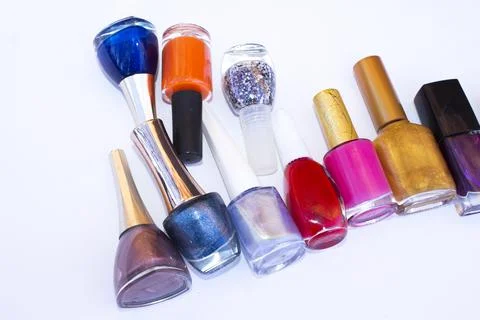 Many nail varnish bottles on the table Stock Photos