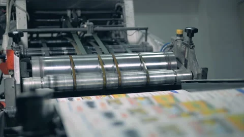 Many newspapers moving on typographic conveyor with a roller. Stock Footage 113558778