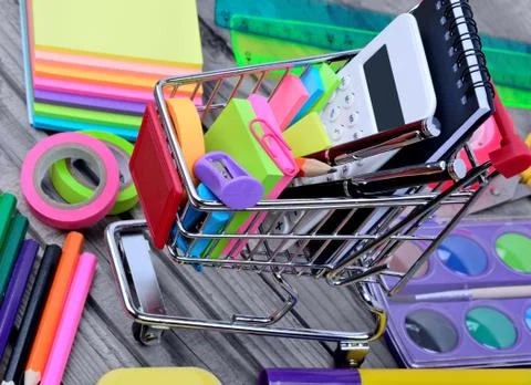 Many objects school in a shopping cart Stock Photos