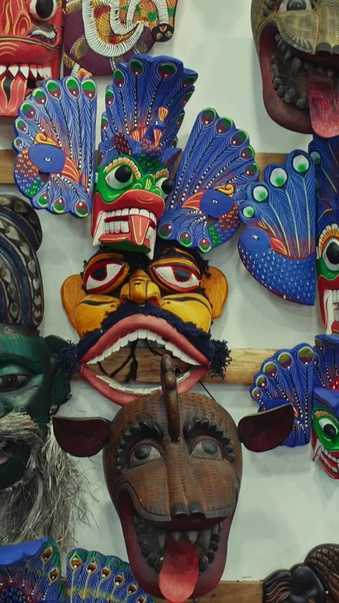 Many old colored Ceylon traditional Wooden masks Sculptures. Sri Lankan Flower Stock Footage 336344400