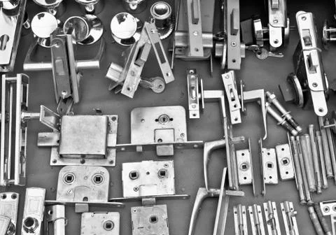 Many Old door locks on open-air bazaar BW Stock Photos