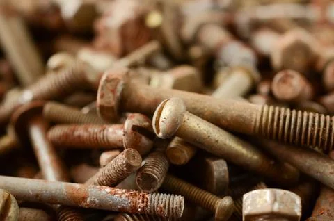 Many old rusty nuts and bolts Stock Photos
