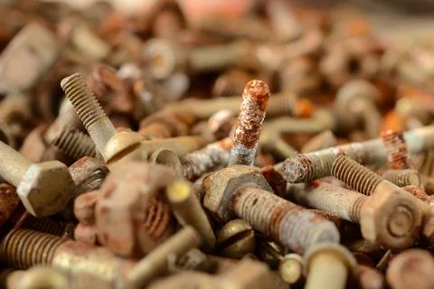 Many old rusty nuts and bolts Stock Photos